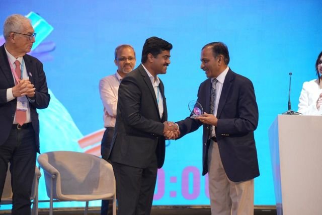 Receiving recognition at an international cancer summit